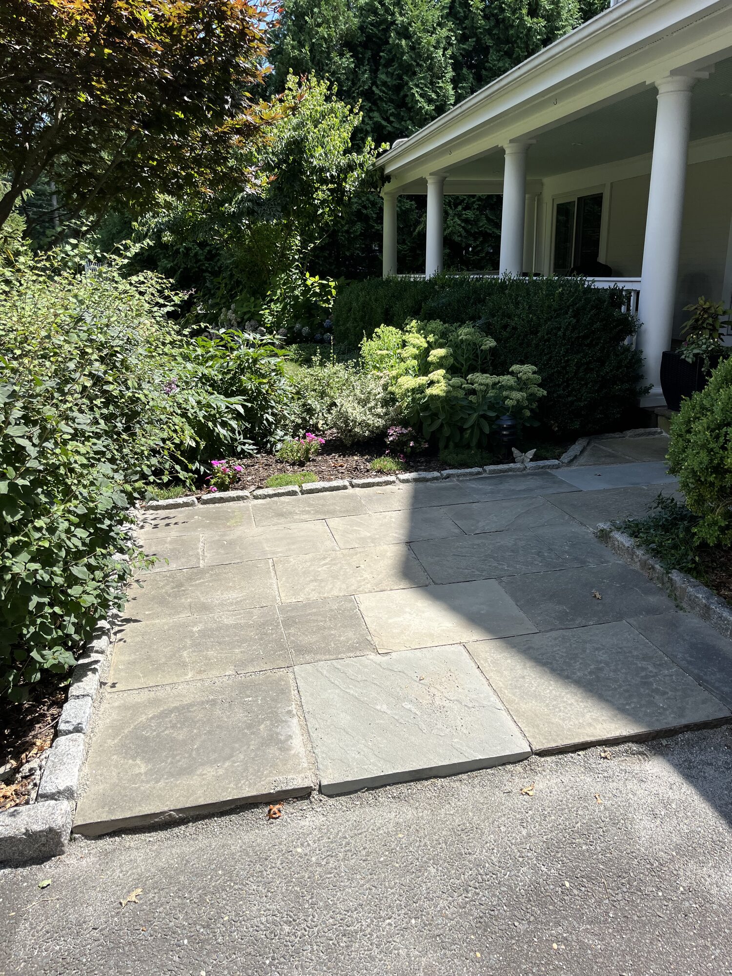 Bluestone patio installed with polymeric sand
