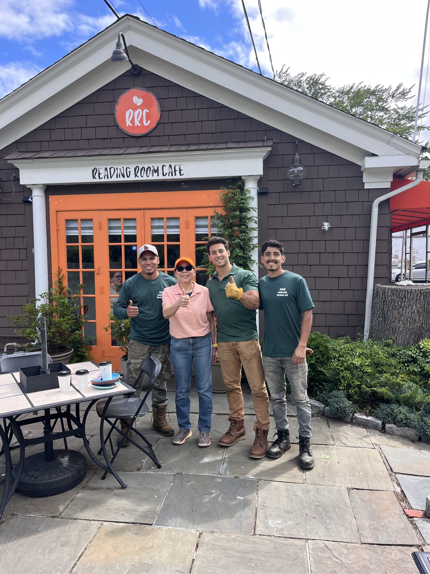 O'Dell Landscape Services crew with a local Old Greenwich customer