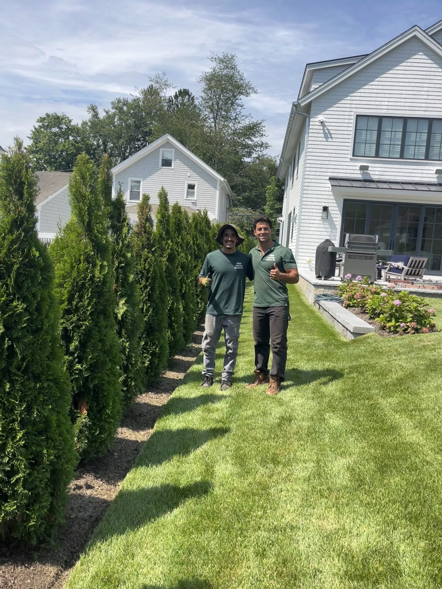 Garrett O'Dell and crew manager William at a Rockland property
