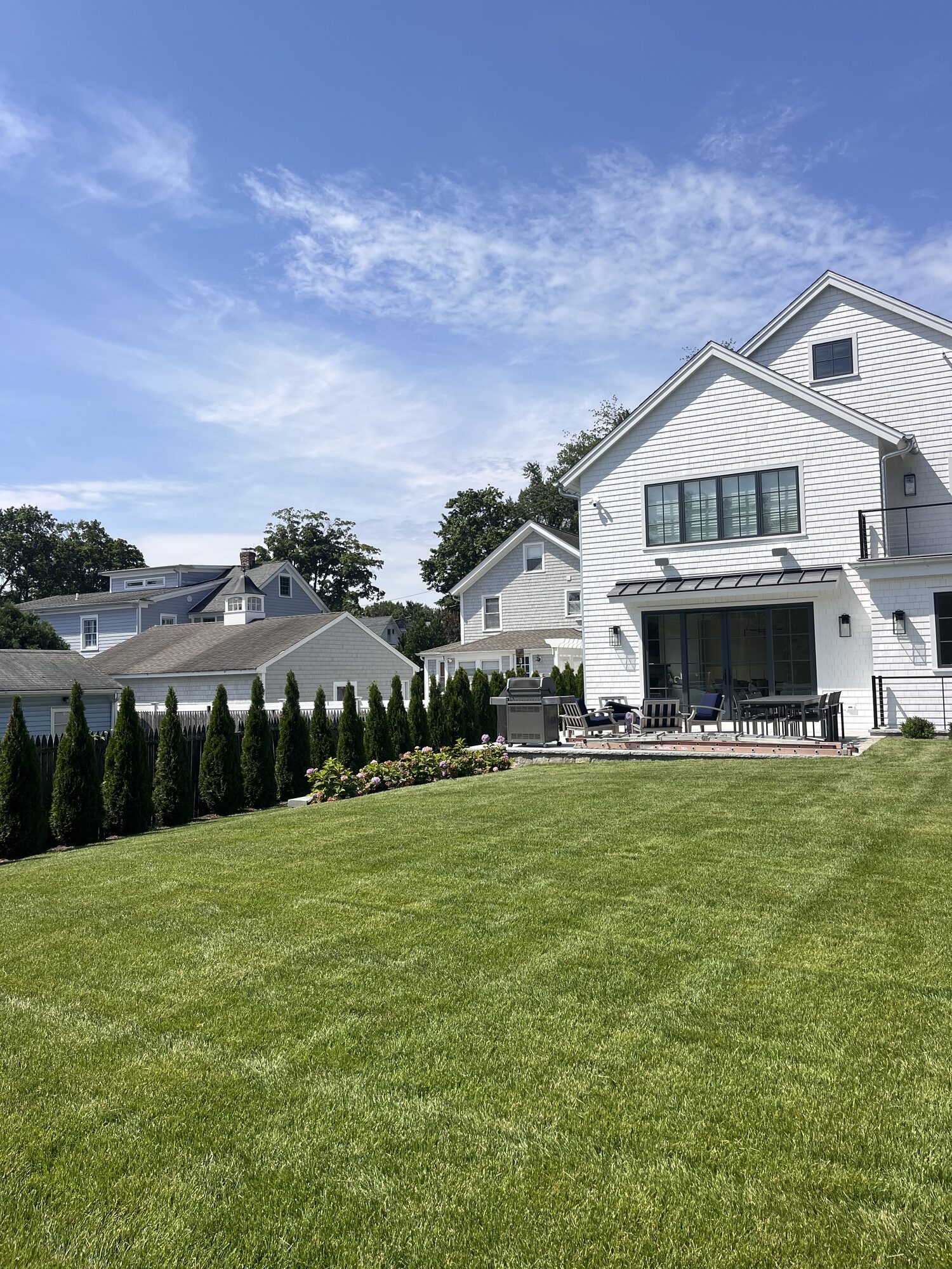 Striped lawn at a Rockland Place property
